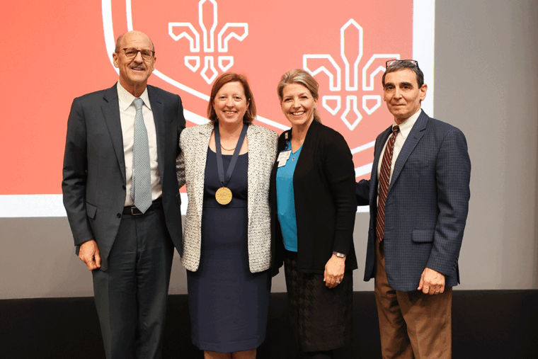 David Perlmutter, MD, dean of the School of Medicine; Cooper; Tanya Lieber Waskiewicz, chief development officer for St. Louis Children's Hospital; and Gary Silverman, MD, head of the Department of Pediatrics and pediatrician-in-chief at St. Louis Children's Hospital