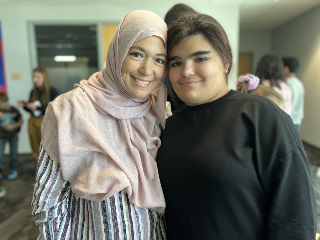 Stephanie Sallam and daughter, Rayhanna, pose for a picture at the DeSanto-Shinawi Syndrome clinic at St. Louis Children's Hospital on Sept. 29, 2022. 
